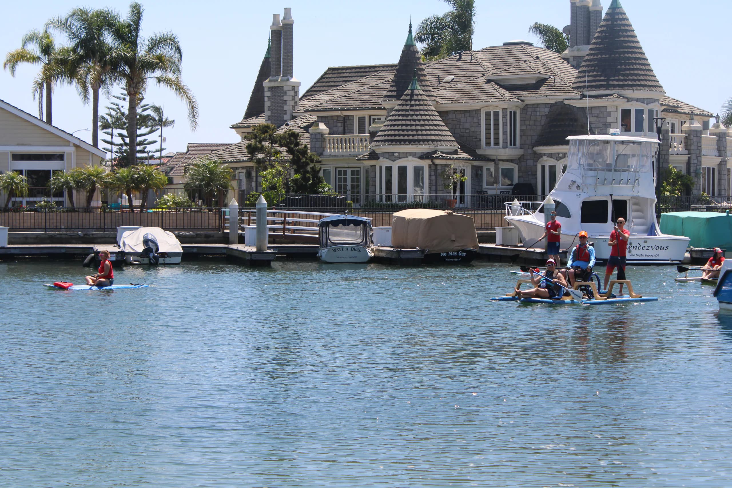 Paddleboards and AFF participants on the water near Newport Beach